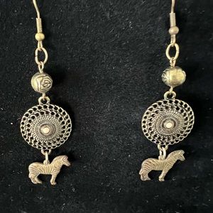 Zebra dangle Earrings are bronze color 3”